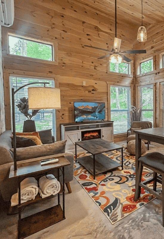 Whispering Woods is a one-bedroom vacation rental cabin in Cosby, TN, part of the Proffitt Park neighborhood of homes.