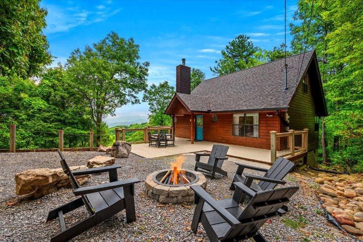 Sanctuary Song is a Gatlinburg cabin rental with a large fire pit, perfect for ghost stories and s'mores!